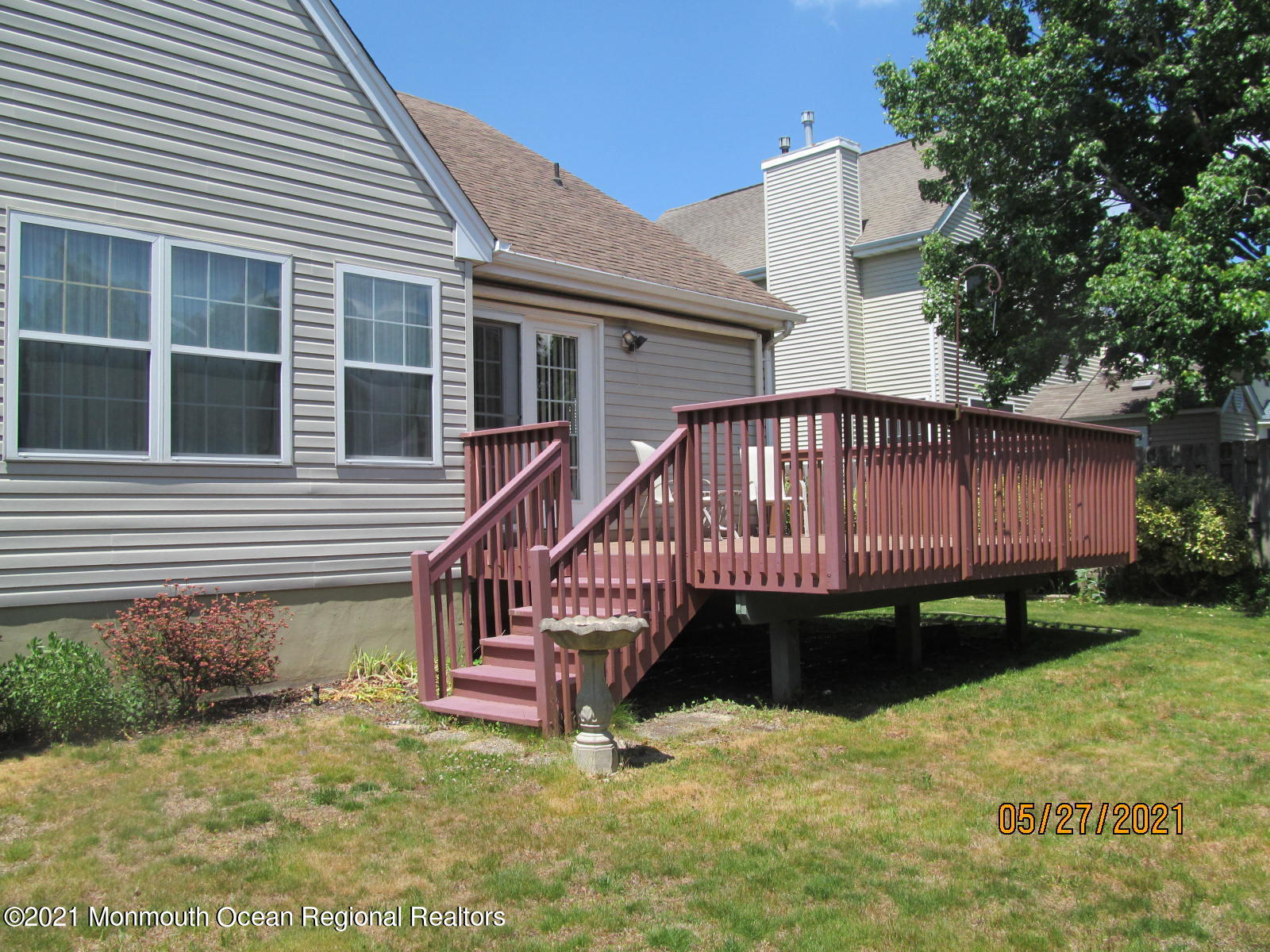 133 Compass Road Manahawkin, NJ 08050 - Photo 5 of 27 a view of a house with backyard and sitting area