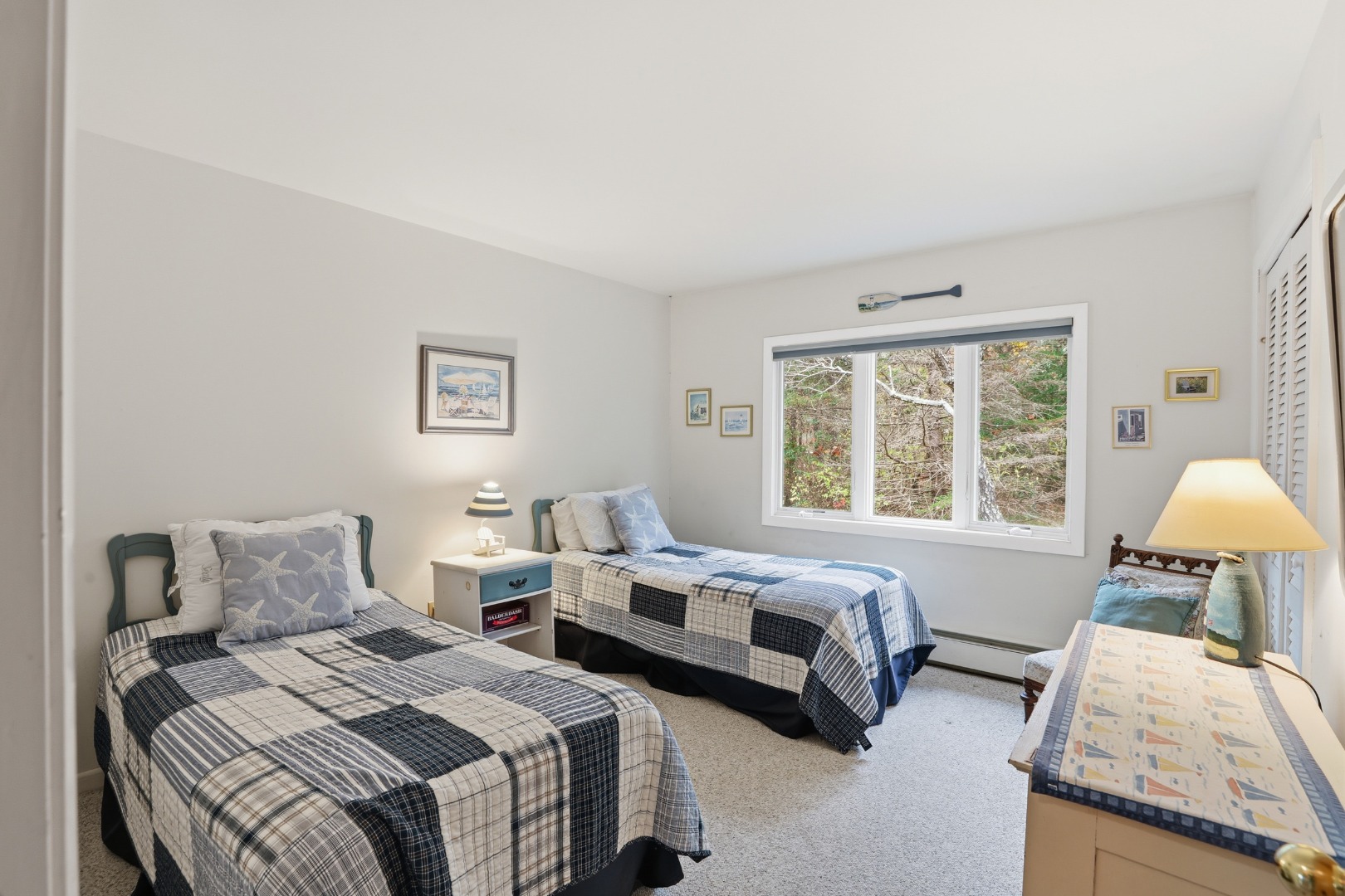 10 Pease Point Road Edgartown, MA 02539 - Photo 13 of 21 a bedroom with two beds and a window