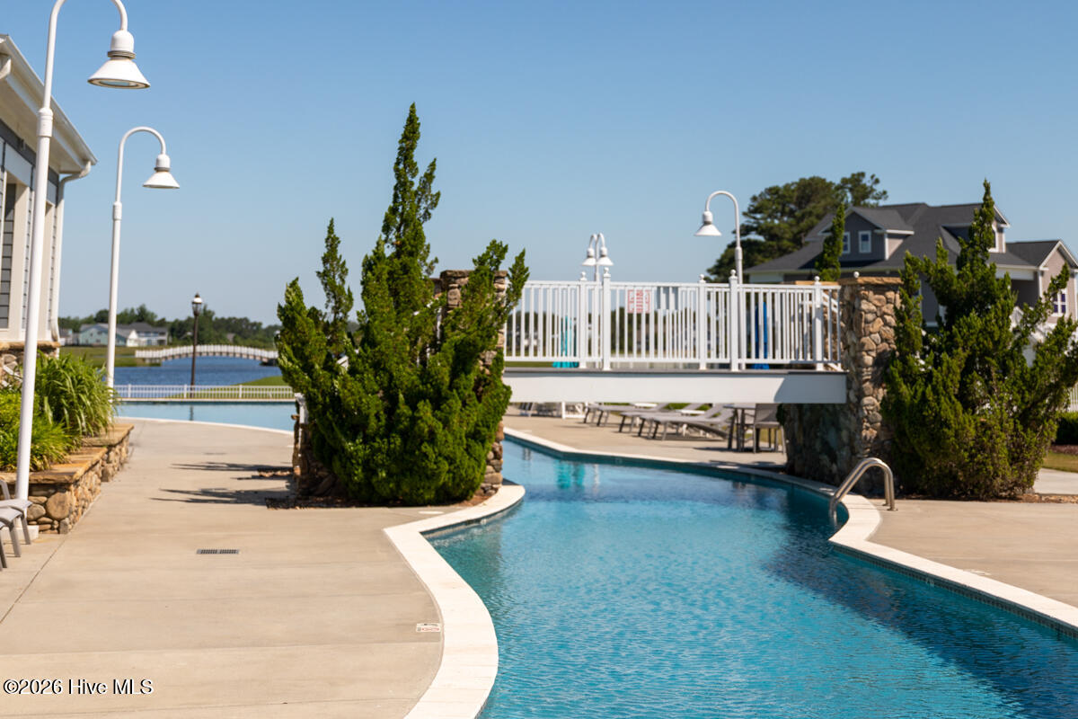 161 Twining Rose Lane Holly Ridge, NC 28445 - Photo 34 of 63 resort-style pool and clubhouse