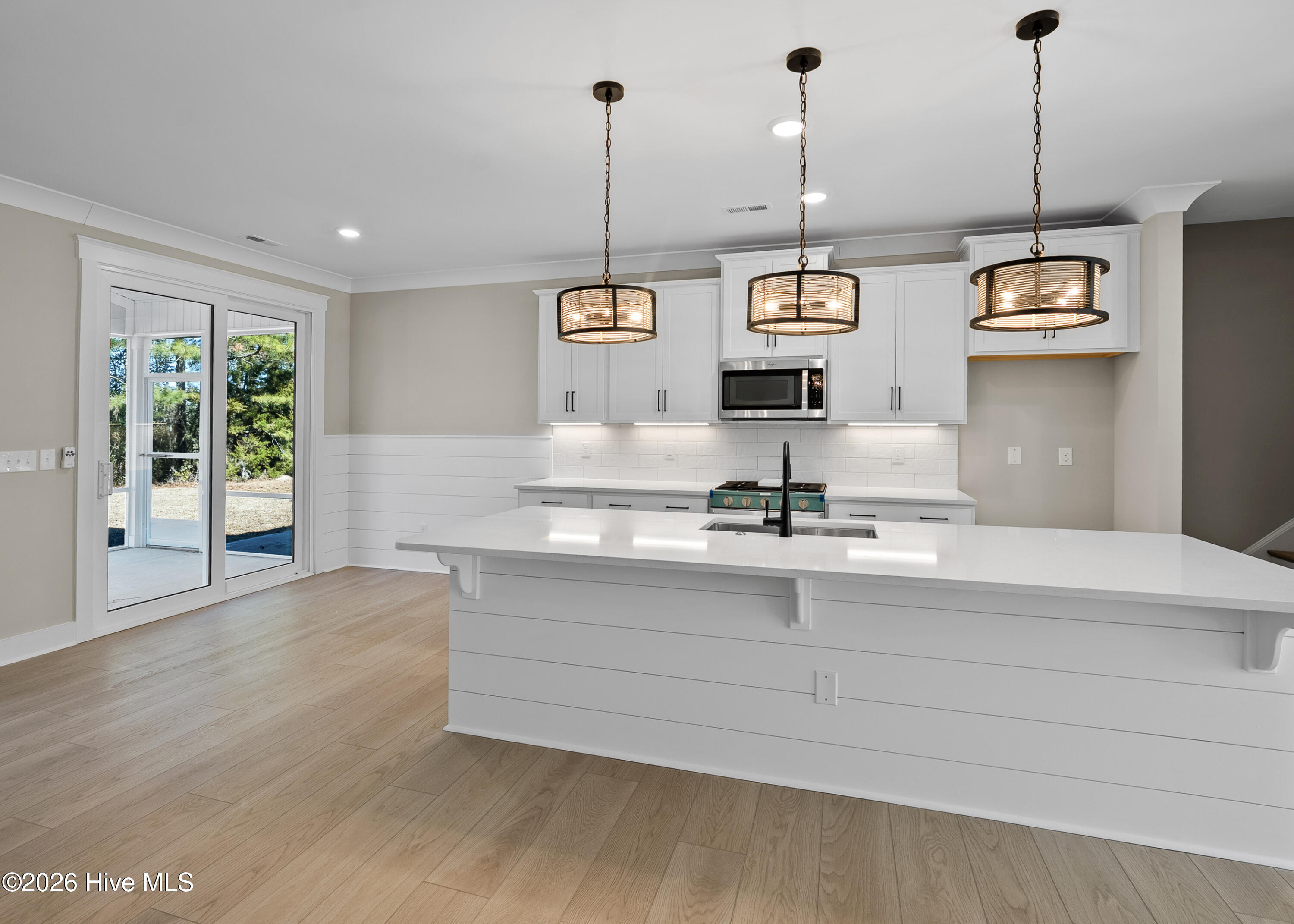 161 Twining Rose Lane Holly Ridge, NC 28445 - Photo 5 of 61 kitchen opens to screened-in porch