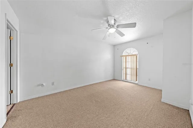 an empty room with a bathroom