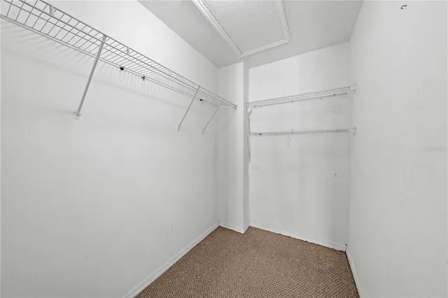 a view of a bathroom with a bathtub and a shower