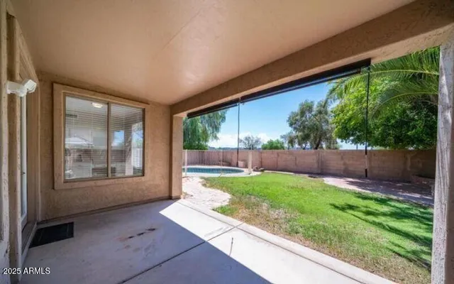 a view of a backyard with a garden