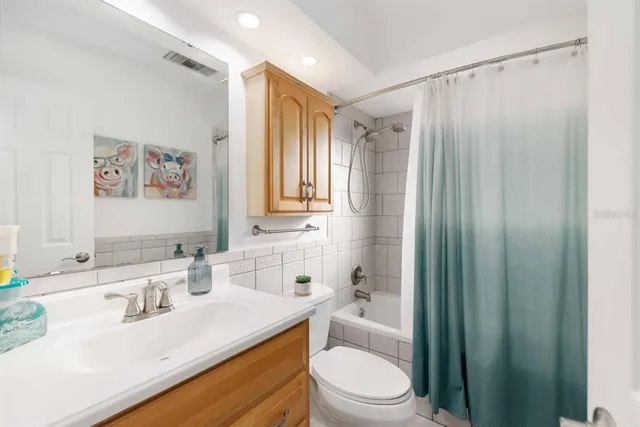 a view of a livingroom with wooden floor