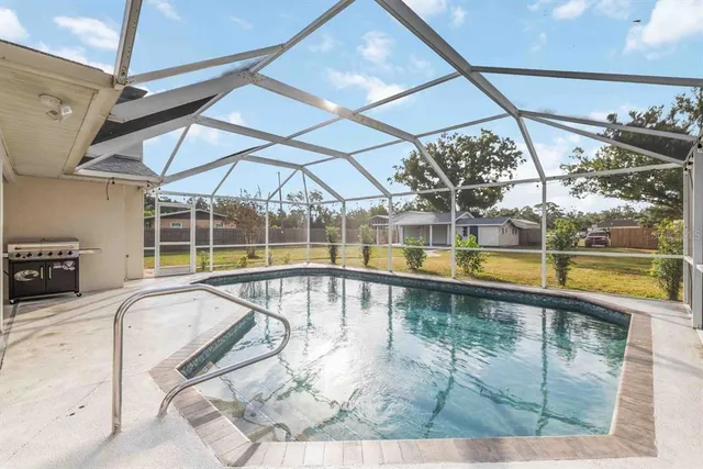a view of a dinning table and chairs in the patio