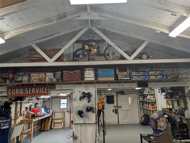 a view of a swimming pool with an outdoor space and seating area