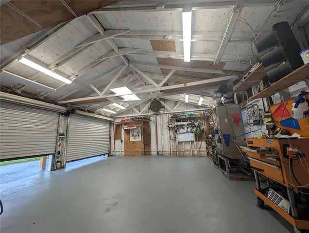 a view of a garage with storage