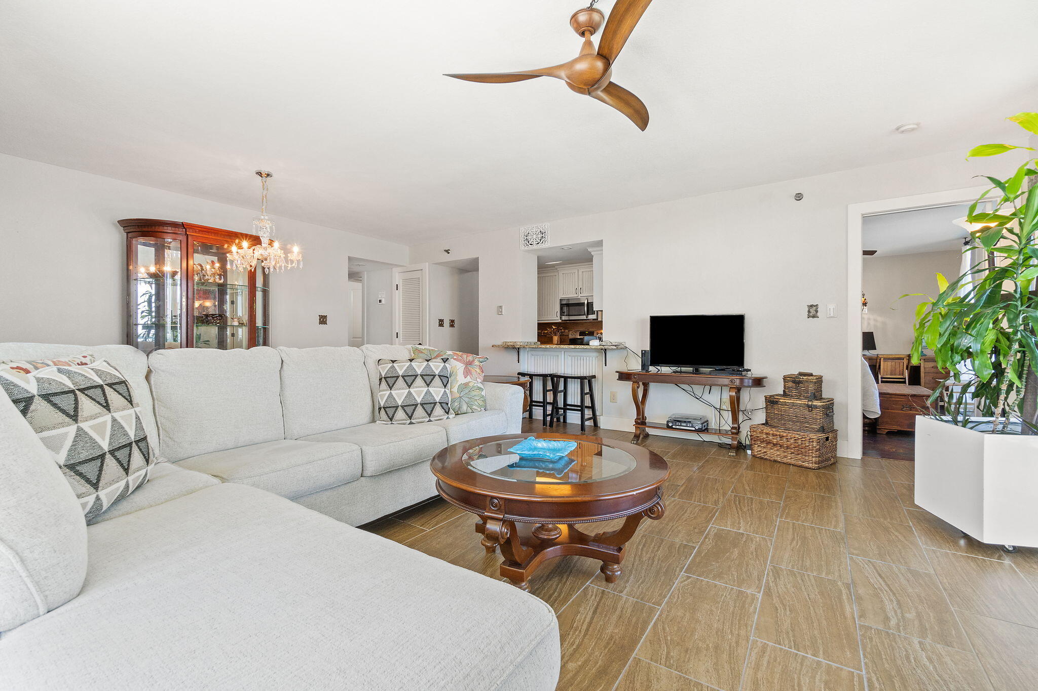1200 Fort Pickens Road, Unit 1E Pensacola Beach, FL 32561 - Photo 14 of 44 a living room with furniture and a flat screen tv