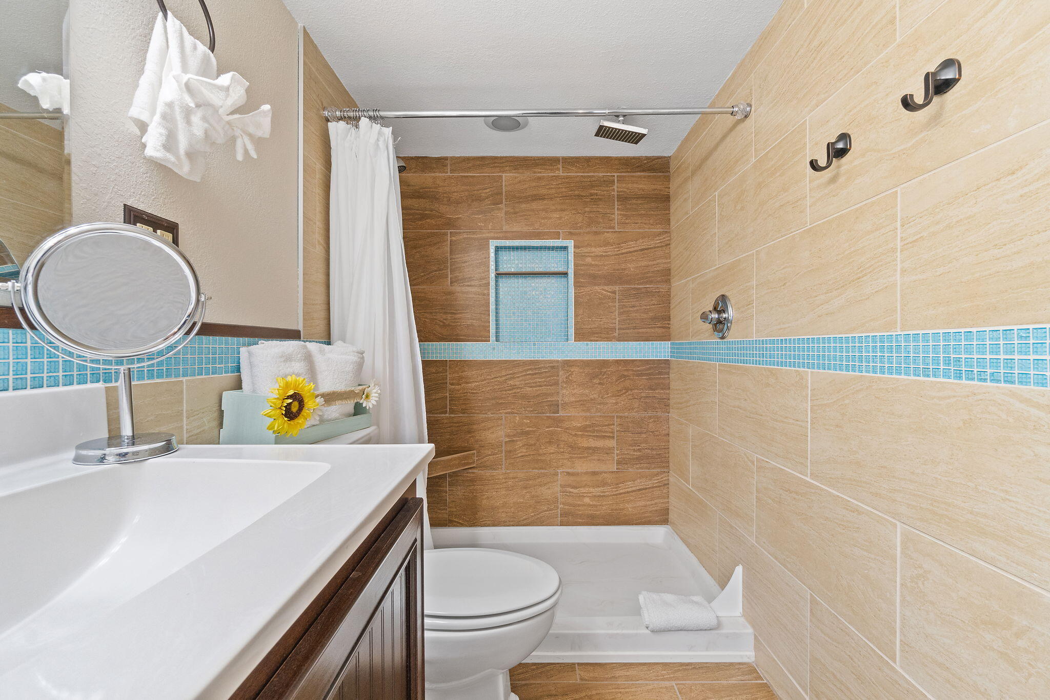 1200 Fort Pickens Road, Unit 1E Pensacola Beach, FL 32561 - Photo 29 of 44 a bathroom with a sink a toilet and shower