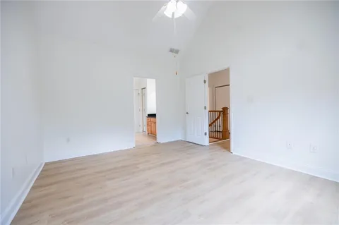 a view of empty room with fan