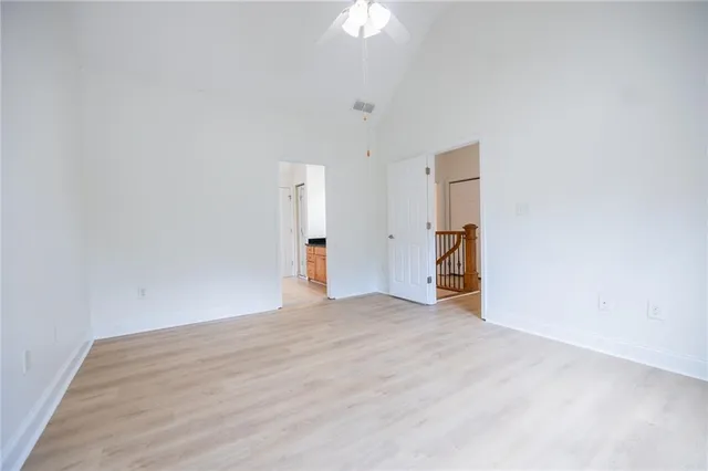 a view of empty room with fan