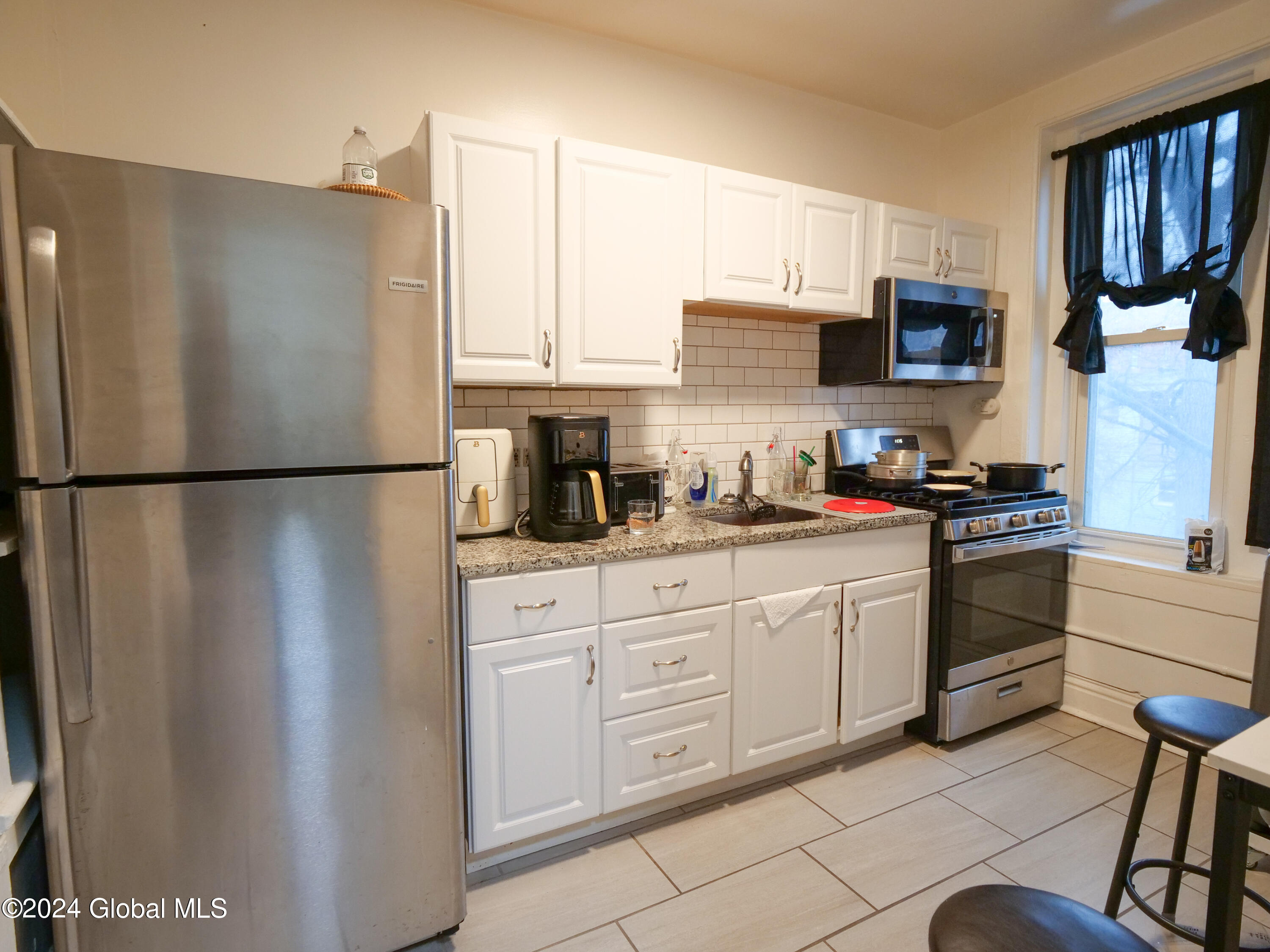 3236 6th Avenue Troy, NY 12180 - Photo 11 of 12 3236 6th Ave upstairs kitchen