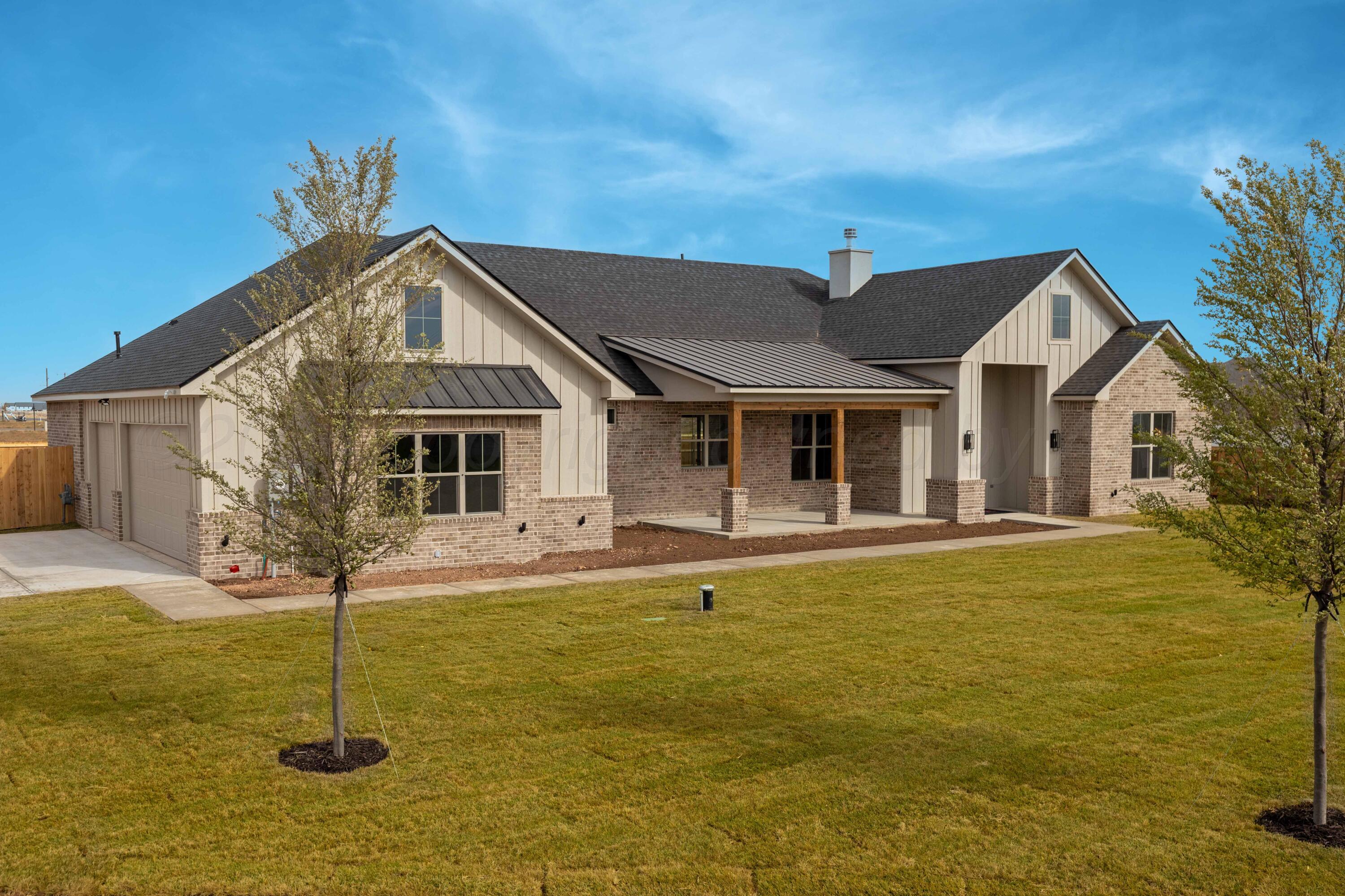 10150 Cactus Flower Road Amarillo, TX 79119 - Photo 1 of 47 a front view of house with yard