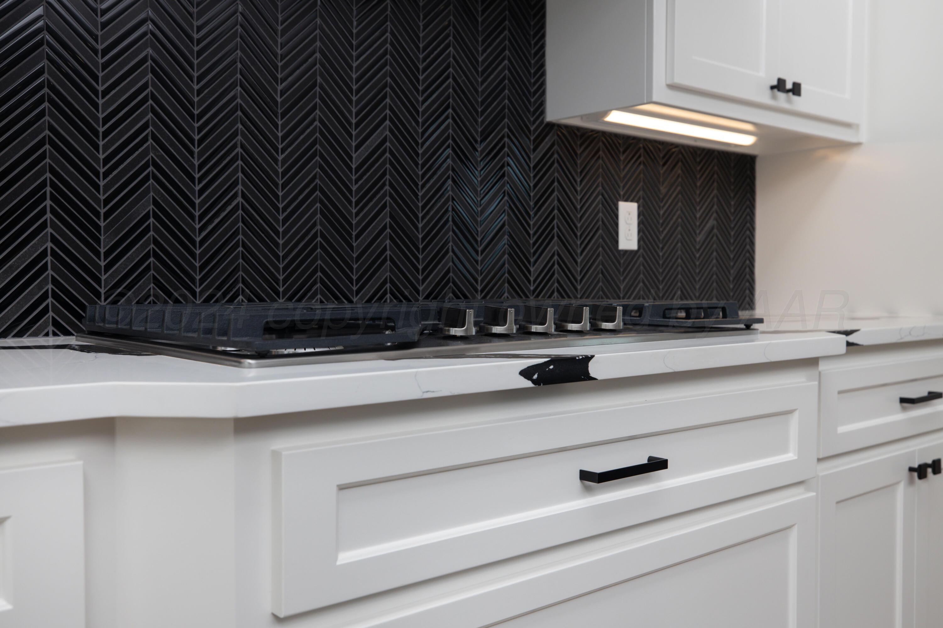 10150 Cactus Flower Road Amarillo, TX 79119 - Photo 15 of 47 a bathroom with a sink and a mirror