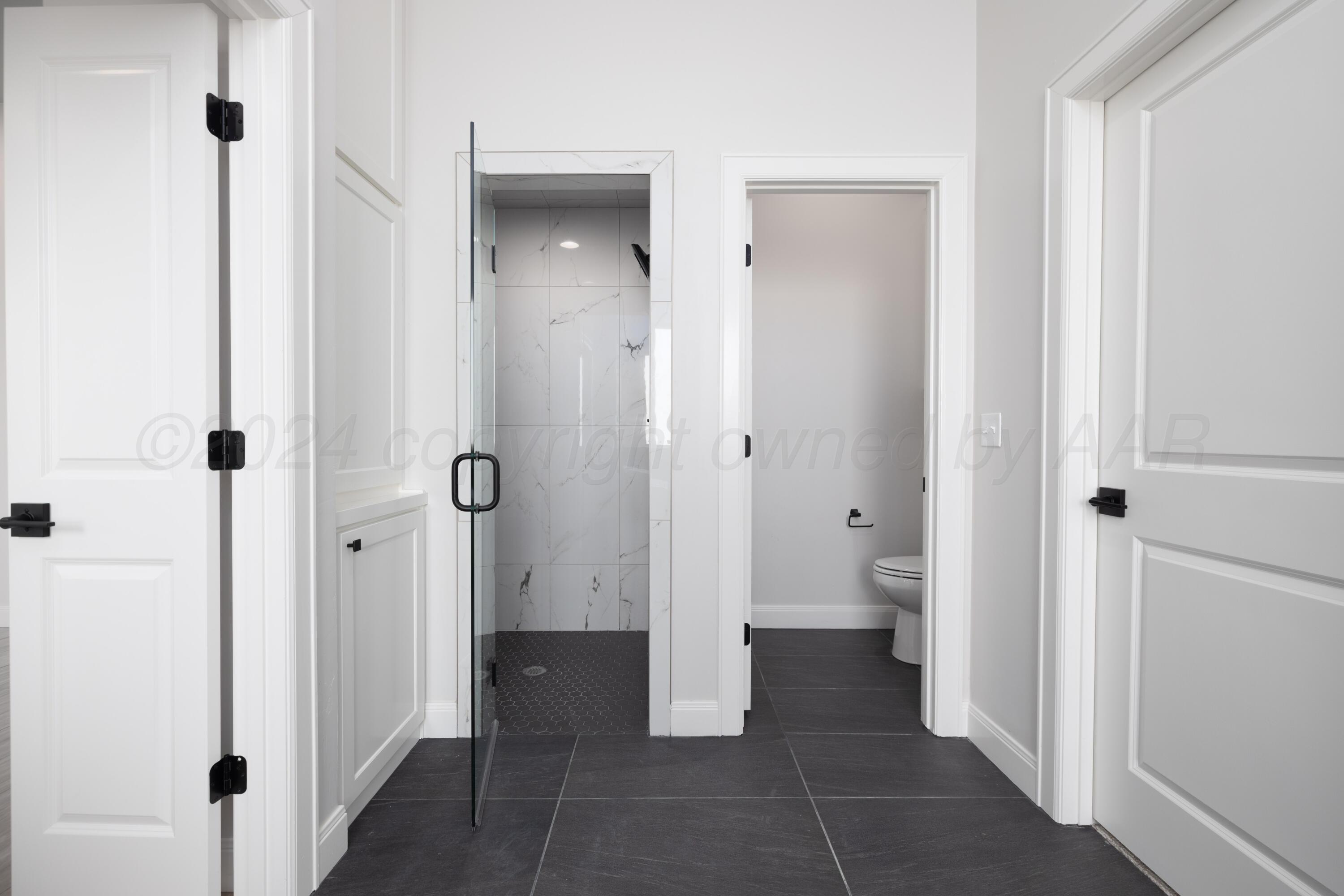 10150 Cactus Flower Road Amarillo, TX 79119 - Photo 28 of 47 a bathroom with a granite countertop shower