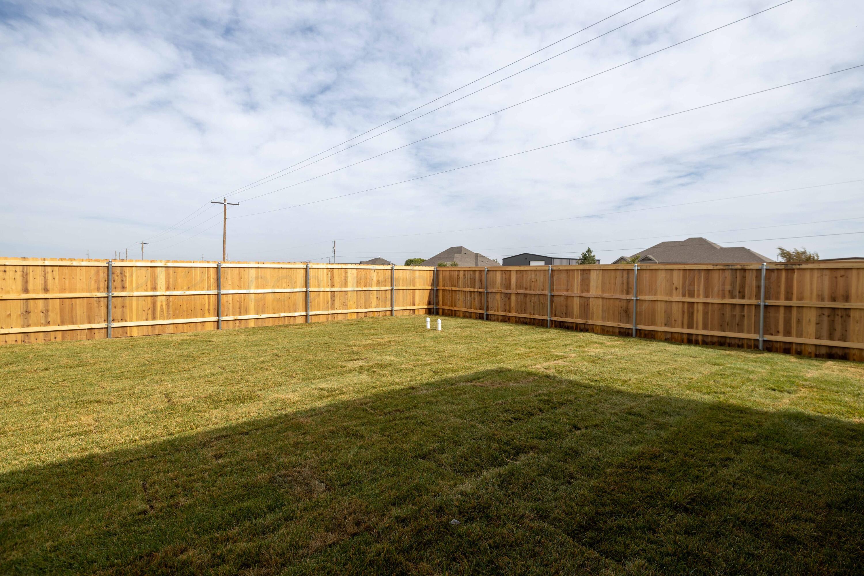 10150 Cactus Flower Road Amarillo, TX 79119 - Photo 43 of 47 a view of an outdoor space and tennis court