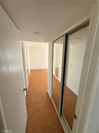 a view of a hallway with a glass door