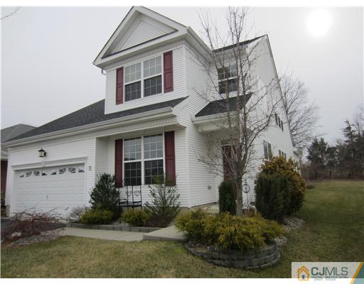 12 Hartack Road Manalapan, NJ 07726 - Photo 14 of 23 a front view of a house with garden