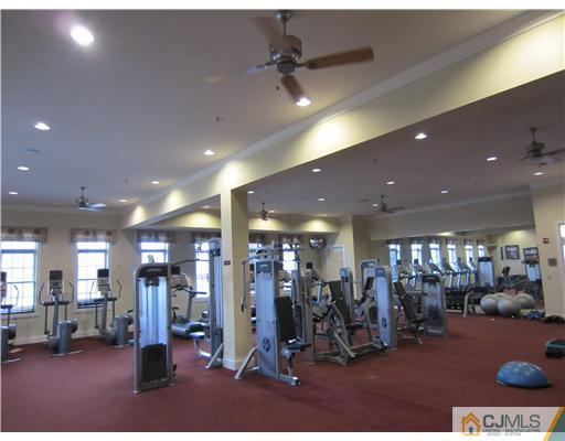 12 Hartack Road Manalapan, NJ 07726 - Photo 22 of 23 a view of a room with gym equipment
