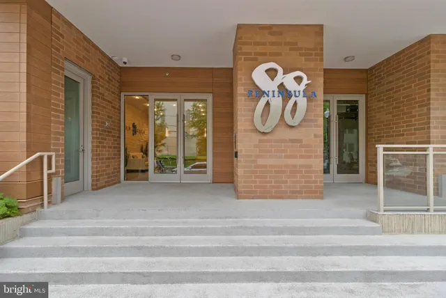 a front view of a building with windows