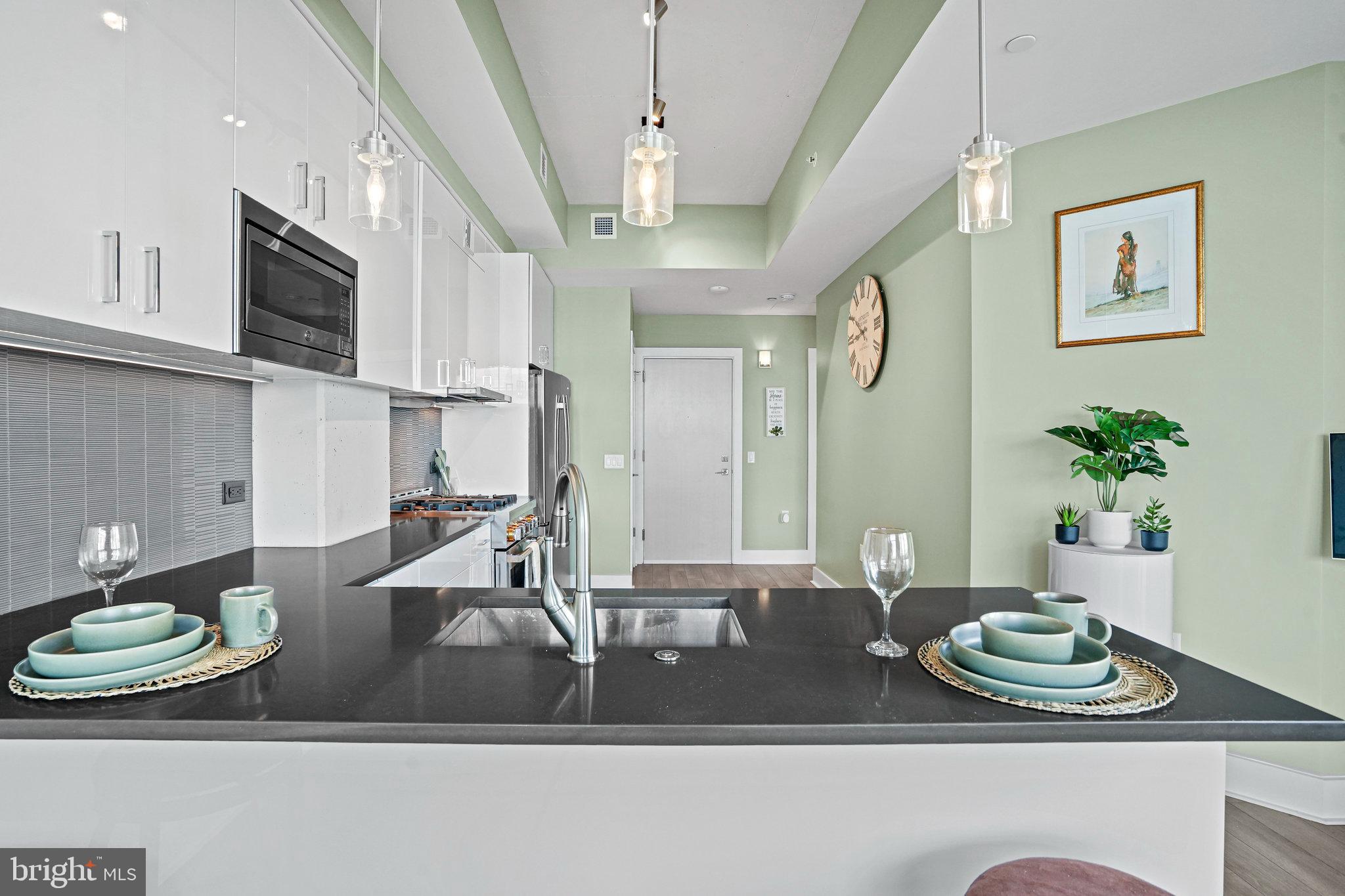 88 V Street Southwest, Unit 807 Washington, DC 20024 - Photo 16 of 57 a view of a dining room with furniture