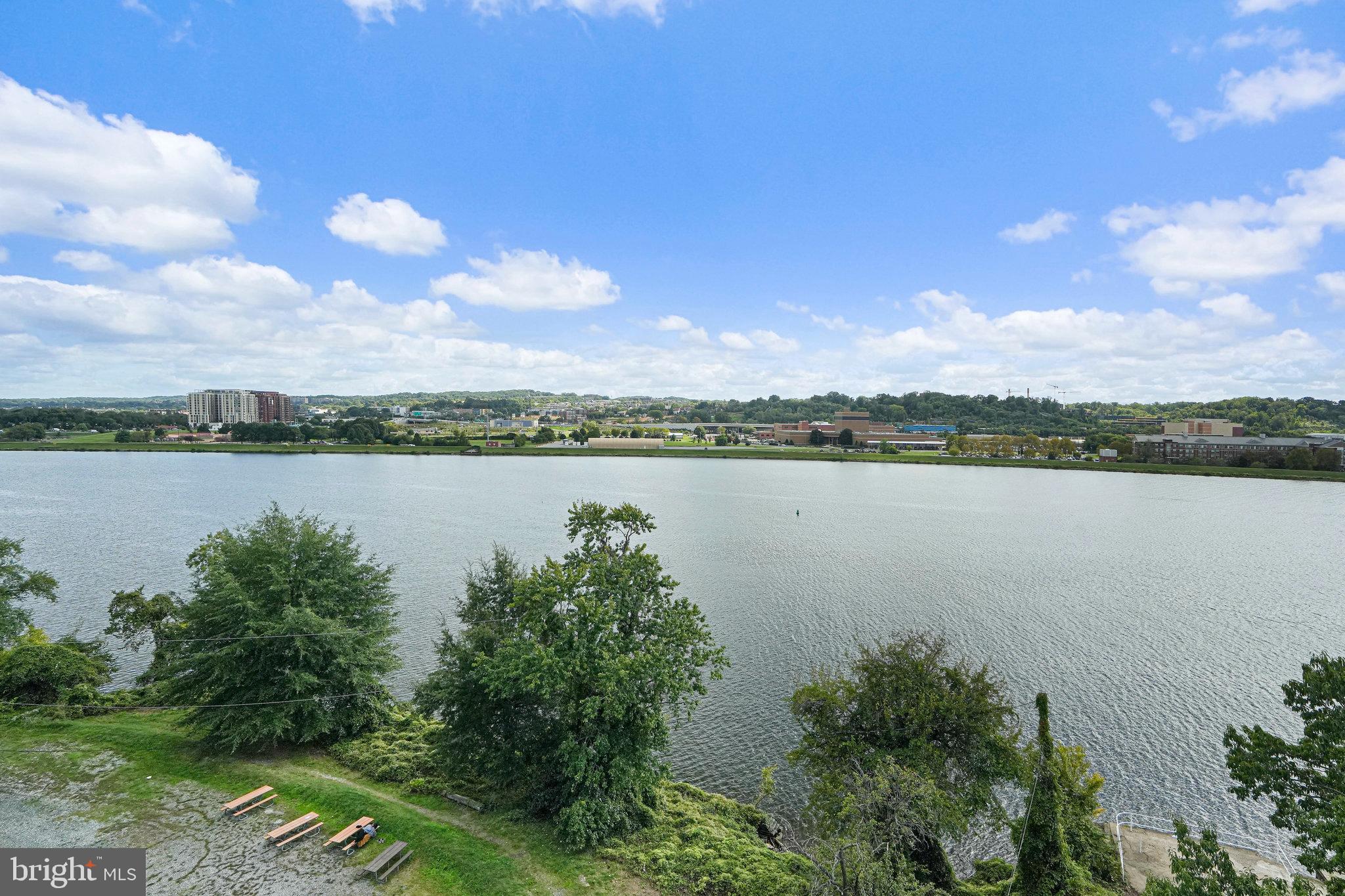 88 V Street Southwest, Unit 807 Washington, DC 20024 - Photo 22 of 57 a view of a lake with houses in the back