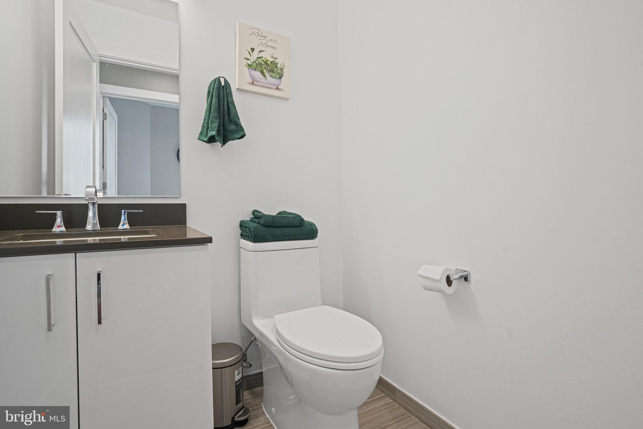 88 V Street Southwest, Unit 807 Washington, DC 20024 - Photo 25 of 57 a bathroom with a toilet and a sink