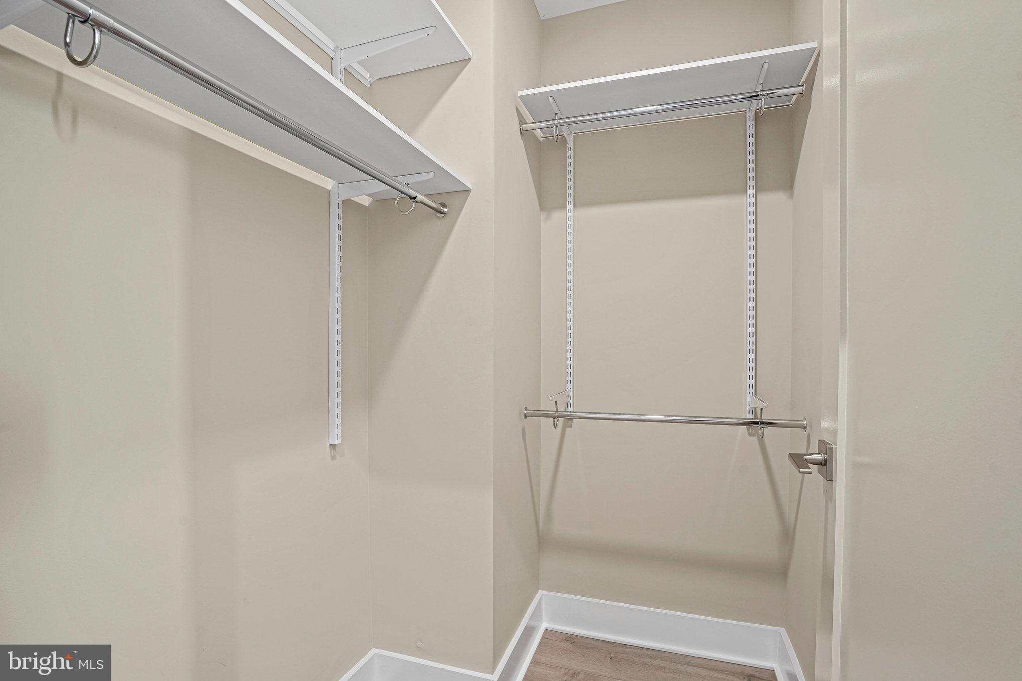 88 V Street Southwest, Unit 807 Washington, DC 20024 - Photo 30 of 57 a bathroom with a glass shower door