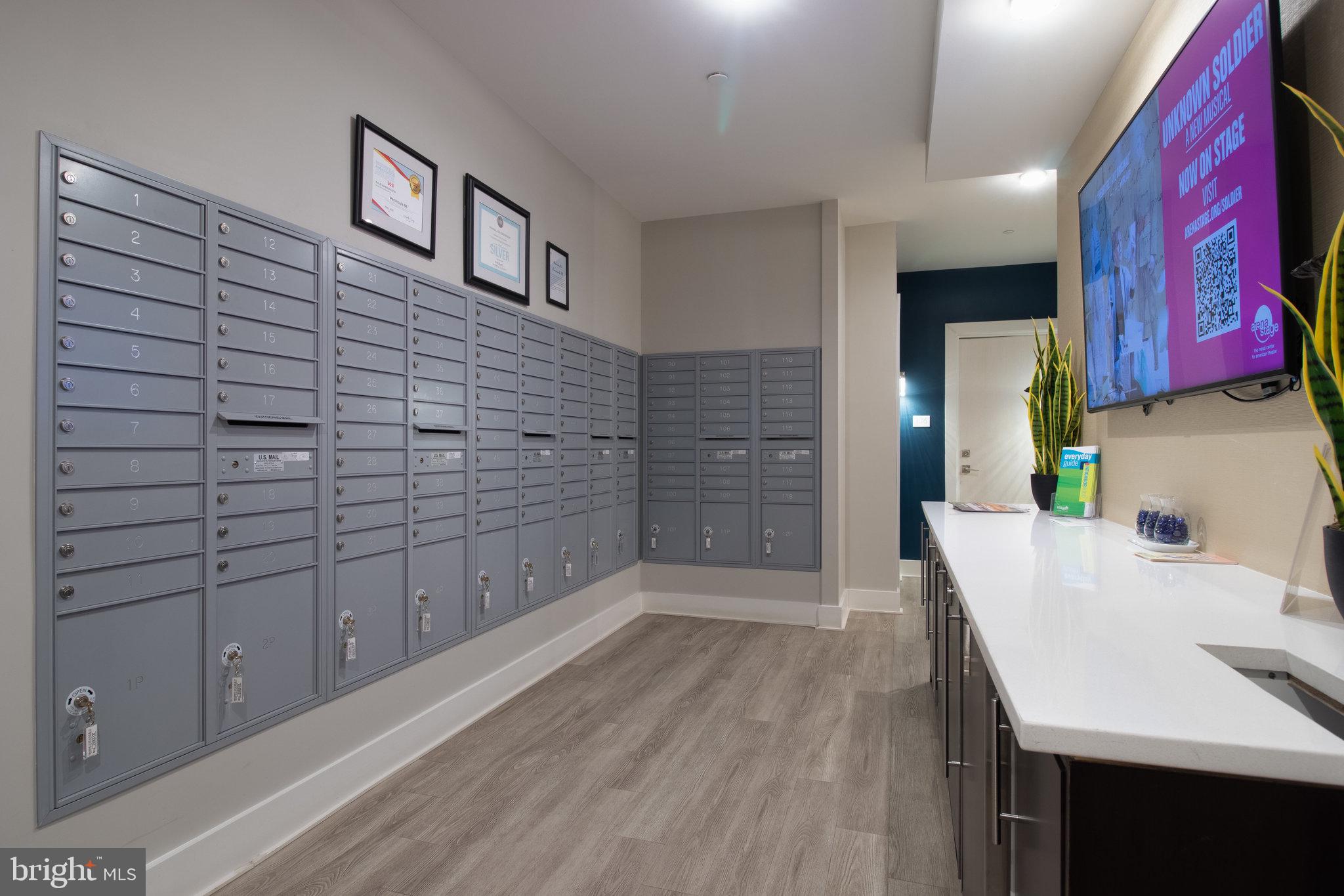 88 V Street Southwest, Unit 807 Washington, DC 20024 - Photo 55 of 57 a bathroom with a sink and a mirror
