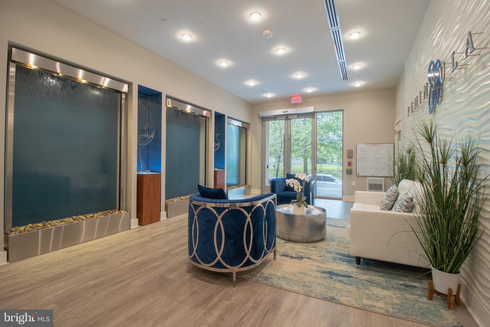 88 V Street Southwest, Unit 807 Washington, DC 20024 - Photo 8 of 57 a view of a livingroom with furniture and windows