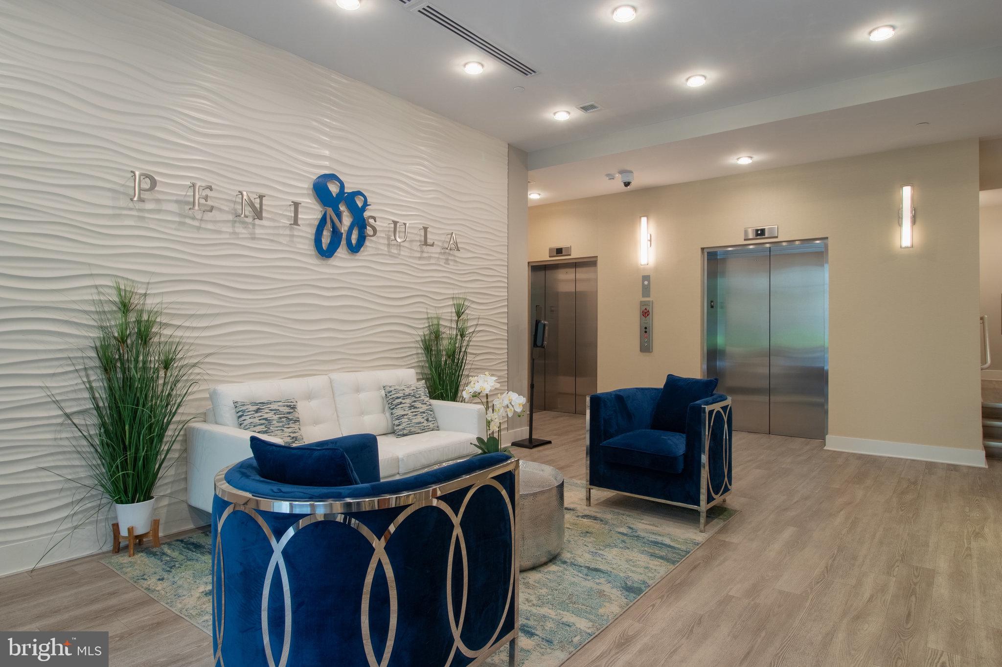 88 V Street Southwest, Unit 807 Washington, DC 20024 - Photo 9 of 57 a living room with furniture and a potted plant