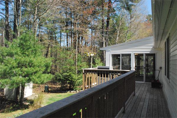 6 Robbins Road Ayer, MA 01432 - Photo 3 of 19 outdoor view of house with deck and outdoor seating