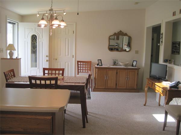 6 Robbins Road Ayer, MA 01432 - Photo 8 of 19 a view of a dining room with furniture and chandelier