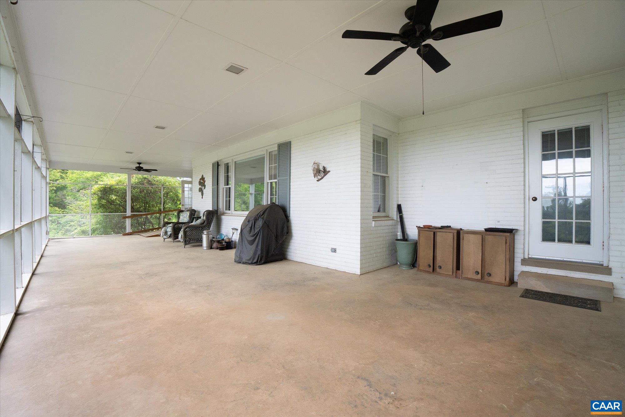 13320 Hackberry Road Orange, VA 22960 - Photo 25 of 47 a view of a livingroom with furniture and a ceiling fan