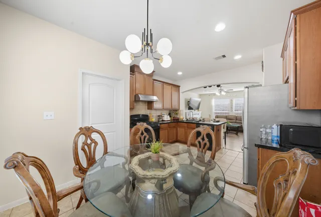 a view of a dining room with furniture