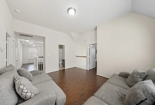 a living room with furniture and a couch