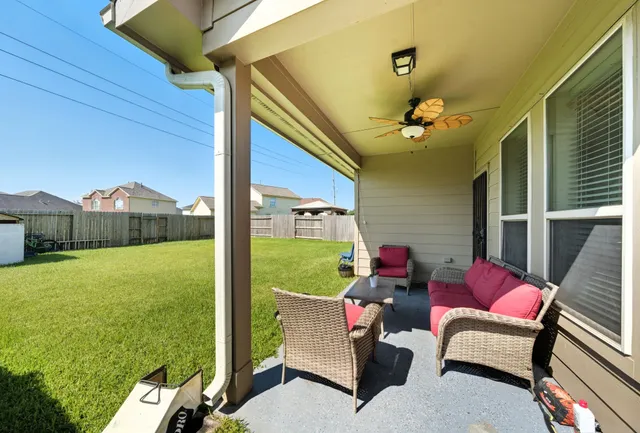 a outdoor living space with furniture and garden view