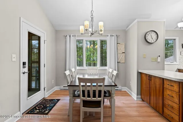 a view of a lake with outdoor seating