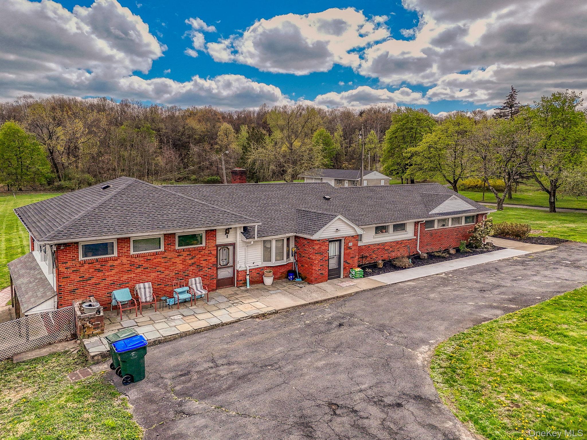 353 Candlestick Hill Road Newburgh, NY 12550 - Photo 12 of 19 an aerial view of a house with a yard