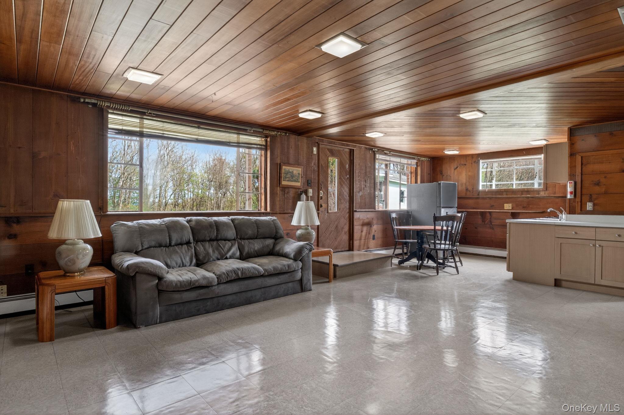 353 Candlestick Hill Road Newburgh, NY 12550 - Photo 19 of 19 a living room with furniture and a large window
