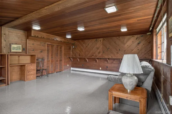 a living room with furniture and a projector