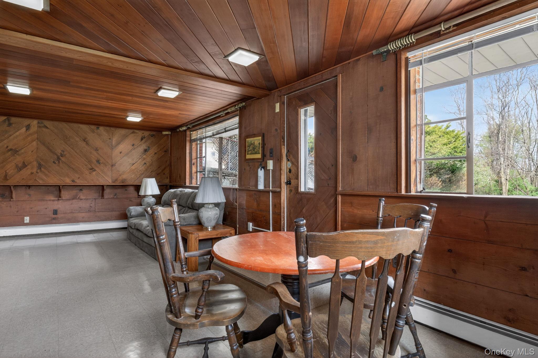 353 Candlestick Hill Road Newburgh, NY 12550 - Photo 8 of 19 a view of a dining room with furniture window and outside view