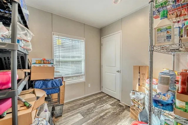 a view of workspace with furniture and a window