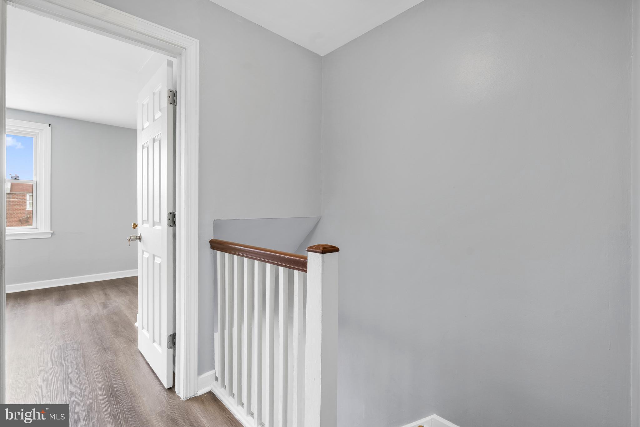 3522 Meridian Street Philadelphia, PA 19136 - Photo 12 of 18 a view of a hallway with wooden floor