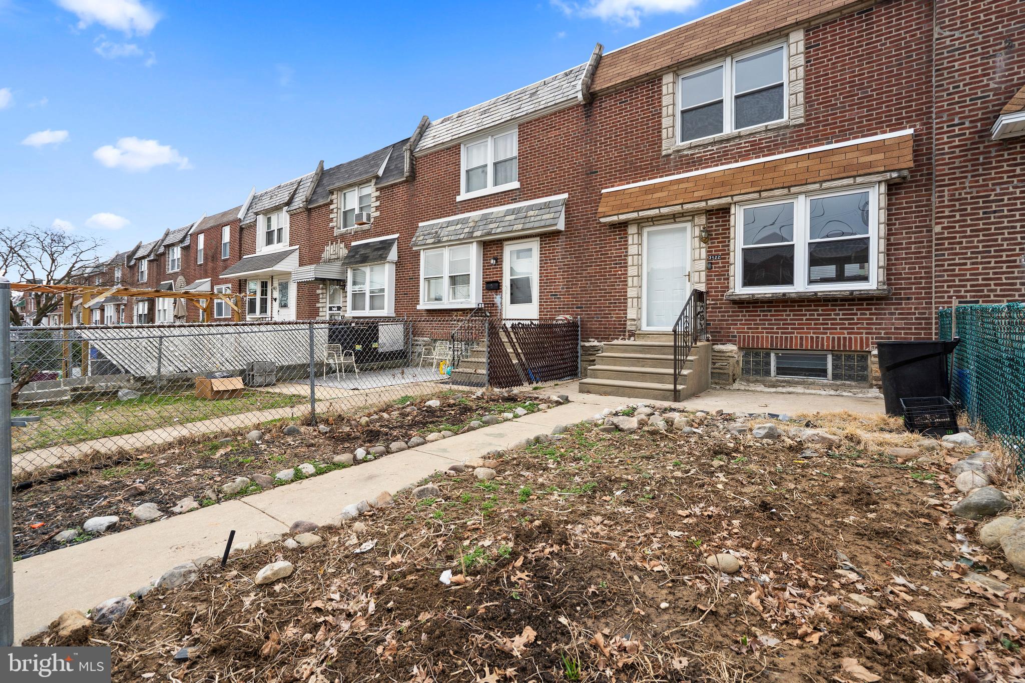 3522 Meridian Street Philadelphia, PA 19136 - Photo 16 of 18 a front view of a house with a yard