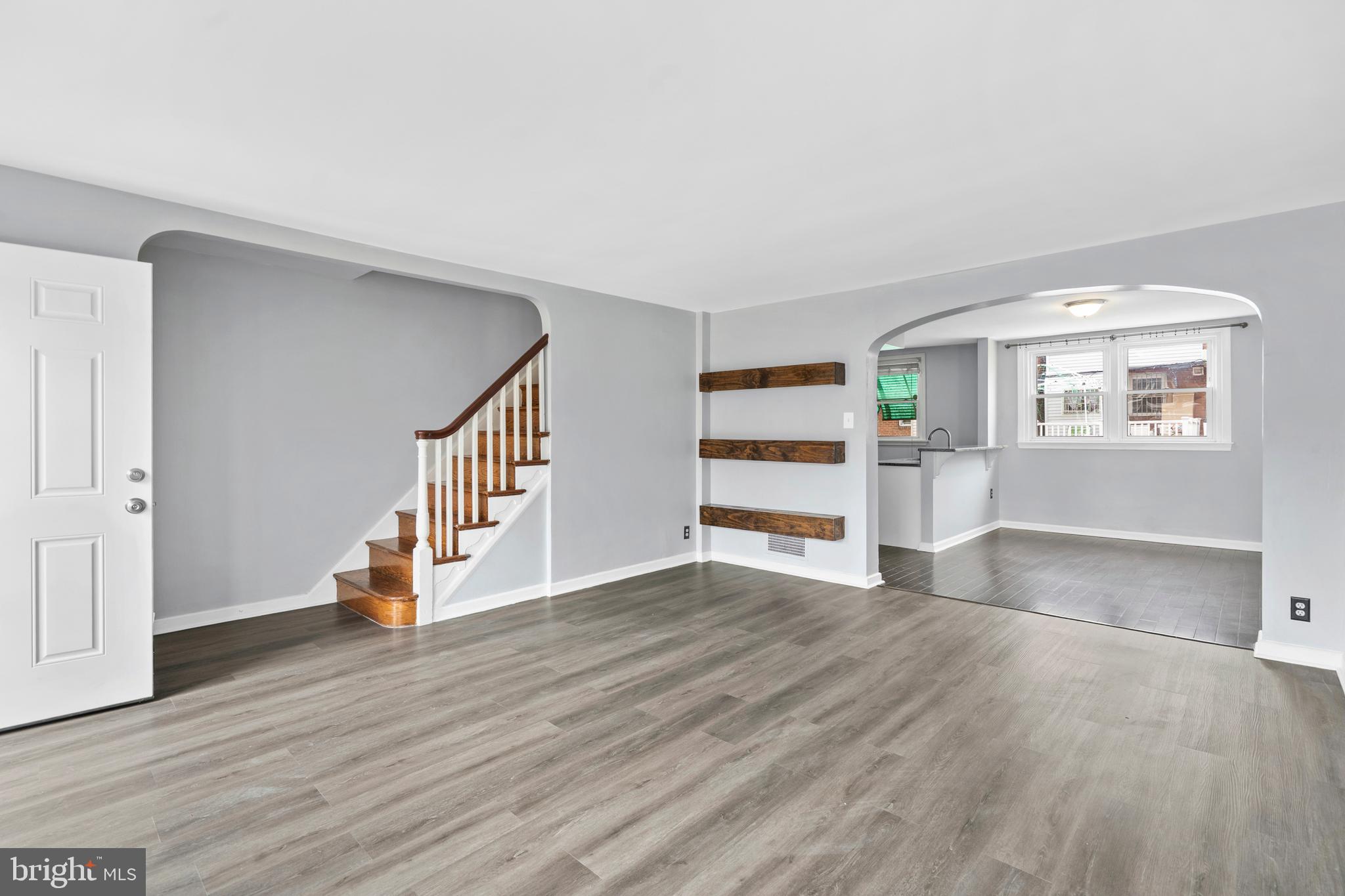 3522 Meridian Street Philadelphia, PA 19136 - Photo 3 of 18 an empty room with wooden floor and windows