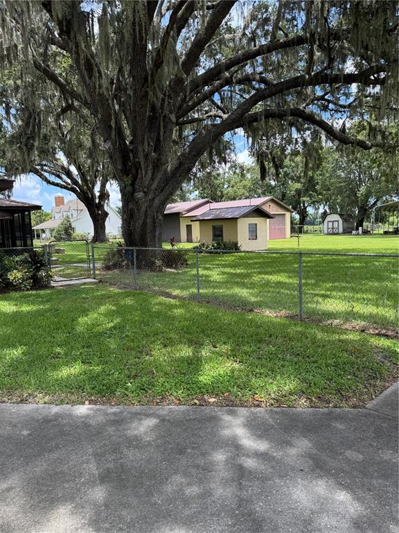 4106 Old Mulberry Road Plant City, FL 33567 - Photo 11 of 52 a front view of house with yard and green space