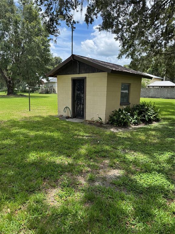 4106 Old Mulberry Road Plant City, FL 33567 - Photo 13 of 52 a house view with a garden space