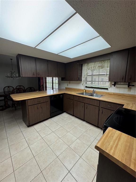 4106 Old Mulberry Road Plant City, FL 33567 - Photo 25 of 52 a kitchen with stainless steel appliances a sink and cabinets
