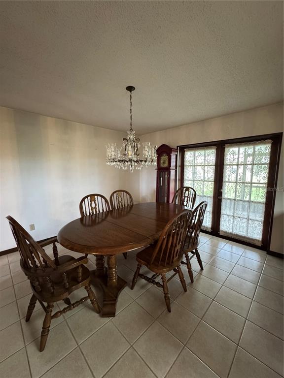 4106 Old Mulberry Road Plant City, FL 33567 - Photo 43 of 52 a view of a dining room with furniture